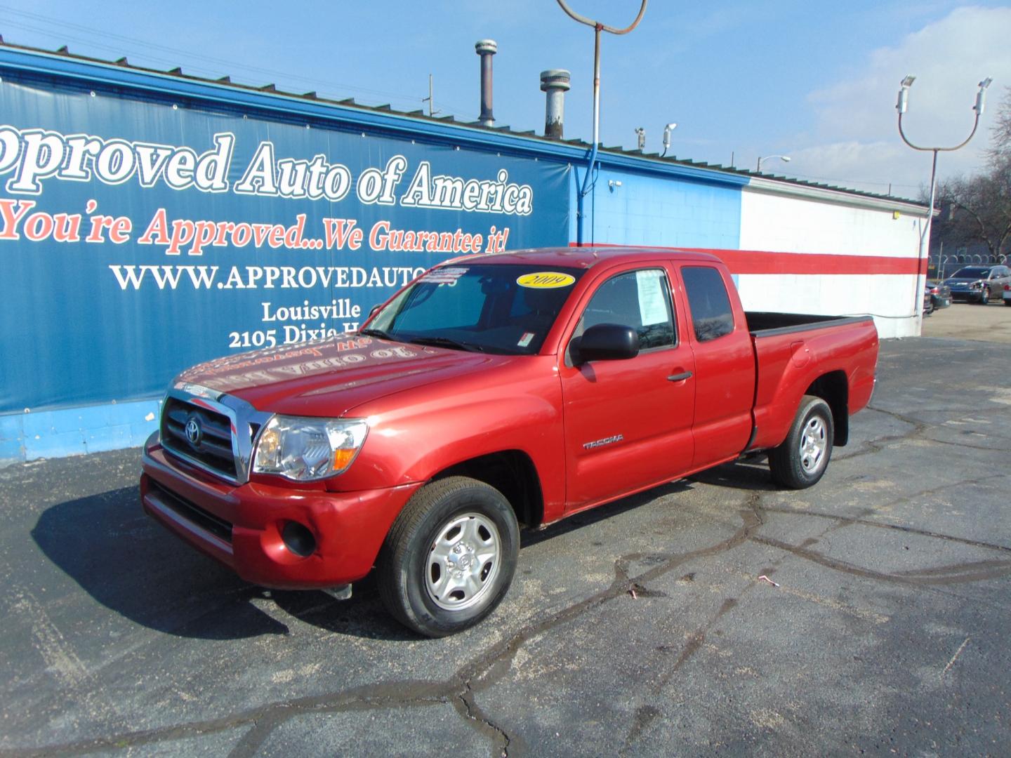 2009 Red Toyota Tacoma Access Cab (5TETX22N49Z) with an 4-Cyl 2.7 Liter engine, Manual, 5-Spd w/Overdrive transmission, located at 2105 Dixie Hwy, Louisville, KY, 40210, (502) 772-3333, 38.220932, -85.795441 - Photo#2